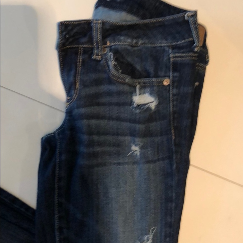 Straight leg torn jeans